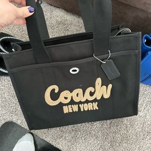 Coach cargo tote bag